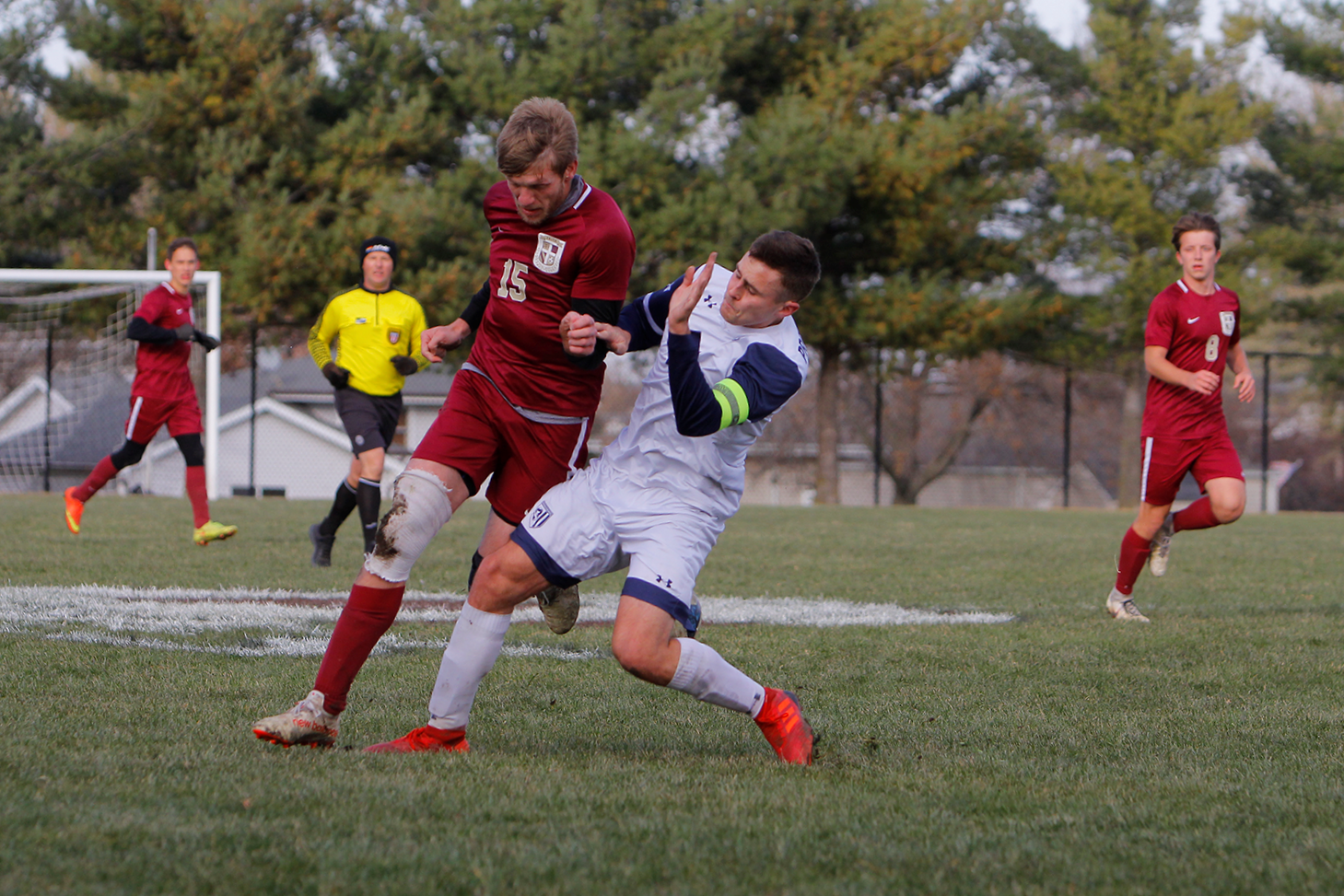 Chase Clark battles a Providence defender in his final game as a Faith Eagle